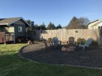 Large yard for lawn games or BBQ.   Nice fire pit 